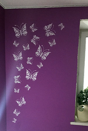 Papillons sur le mur